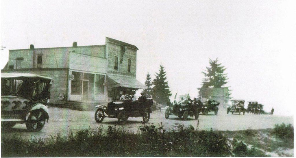 Old cars driving on road