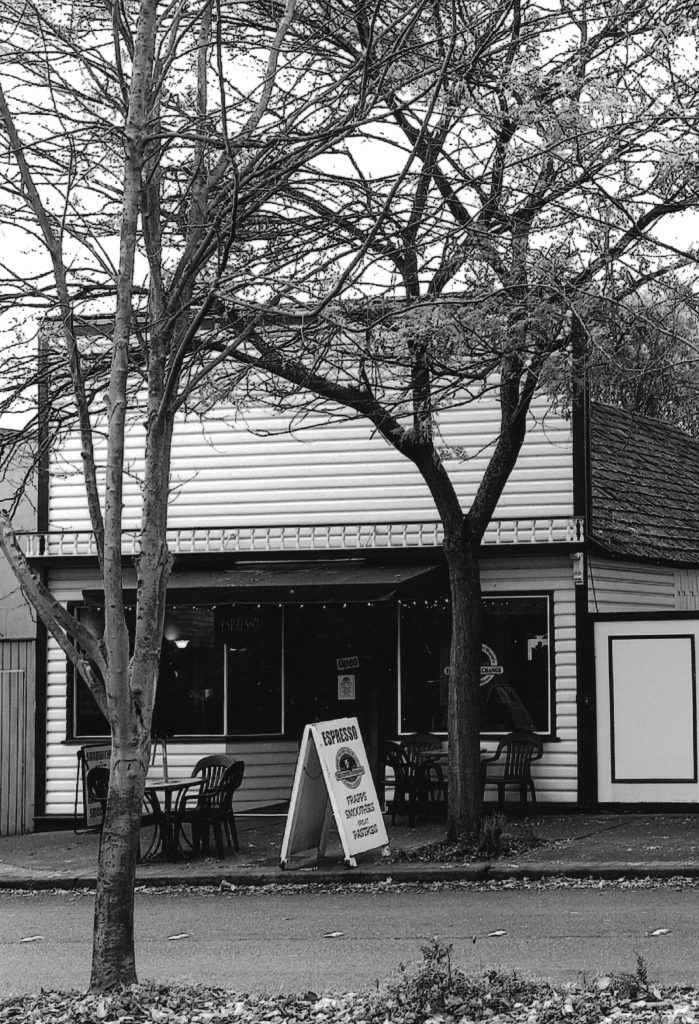 Store front with trees in front